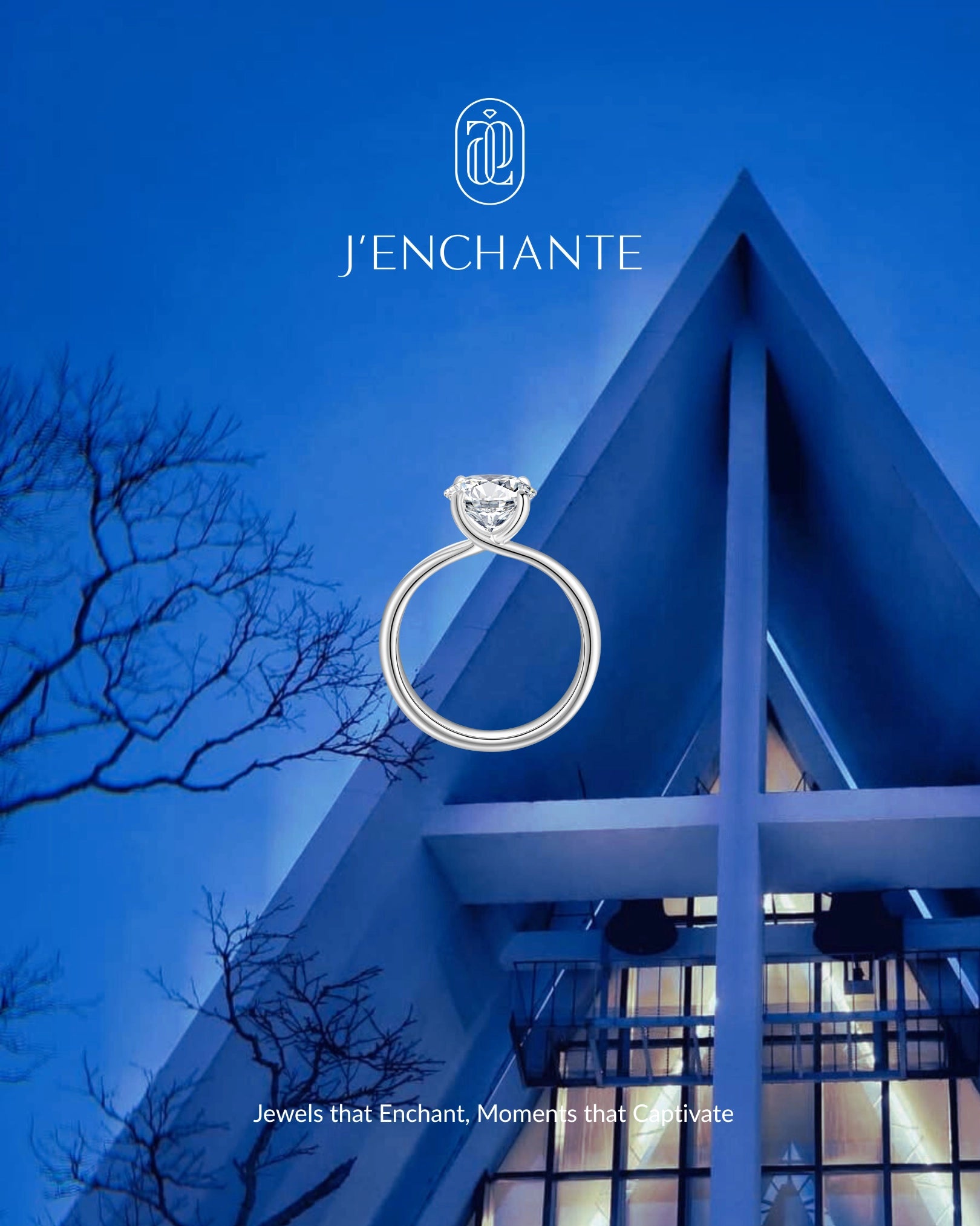 J'ENCHANTE diamond ring against a blue architectural backdrop, expressing the brand's refined 18K gold lab-grown diamond jewelry aesthetic.