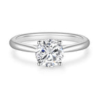 ront detail view of the J'ENCHANTE Classic 18K white gold lab-grown diamond ring, highlighting the round center diamond, four-prong setting and polished band.