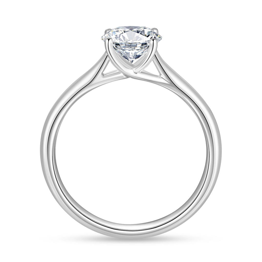 Side view of the J'ENCHANTE Classic 18K white gold lab-grown diamond ring, showing the four-prong setting, open gallery and refined band structure.