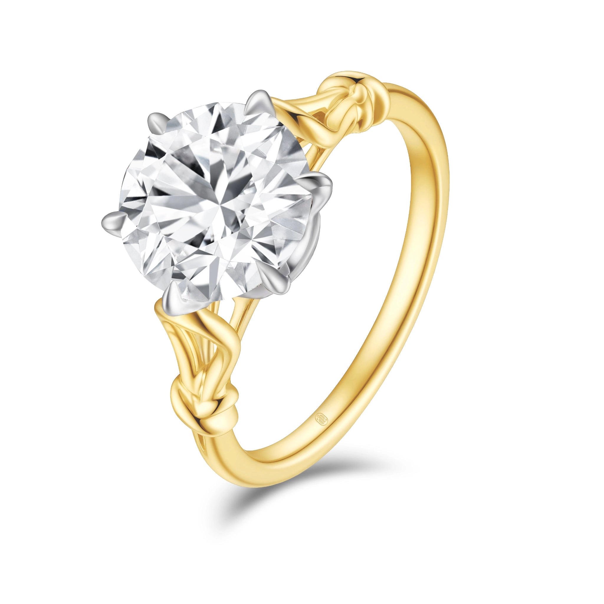 J'ENCHANTE Intertwine 18K gold lab-grown diamond ring, shown on a white background with a round center diamond and intertwined band design.