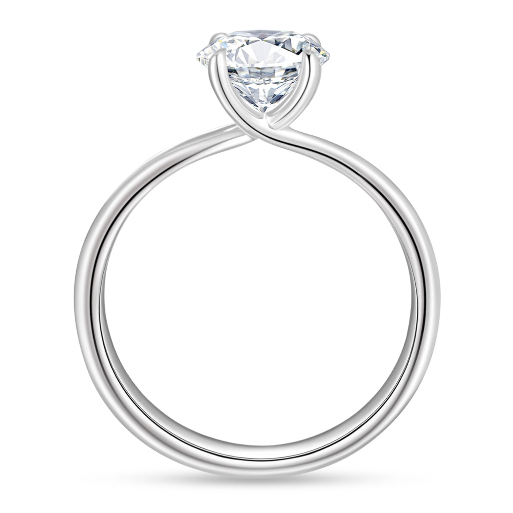 Side view of the J'ENCHANTE Petite 18K white gold lab-grown diamond ring, showing the four-prong setting, center stone basket and slim band structure.