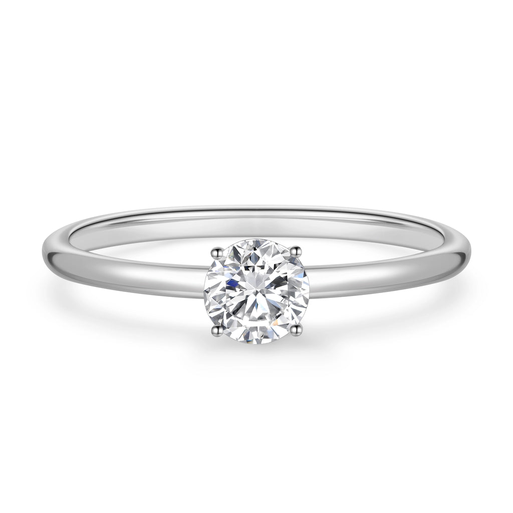 Front detail view of the J'ENCHANTE Soft Curve 18K white gold lab-grown diamond ring, highlighting the round center diamond, four-prong setting and polished band.
