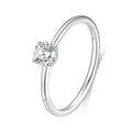 J'ENCHANTE Soft Curve 18K white gold lab-grown diamond solitaire ring, shown on a white background with a round center diamond, four-prong setting and softly curved band.