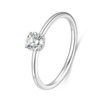 J'ENCHANTE Soft Curve 18K white gold lab-grown diamond solitaire ring, shown on a white background with a round center diamond, four-prong setting and softly curved band.
