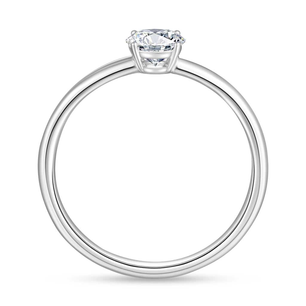 Side view of the J'ENCHANTE Soft Curve 18K white gold lab-grown diamond ring, showing the four-prong setting, center stone basket and refined band structure.
