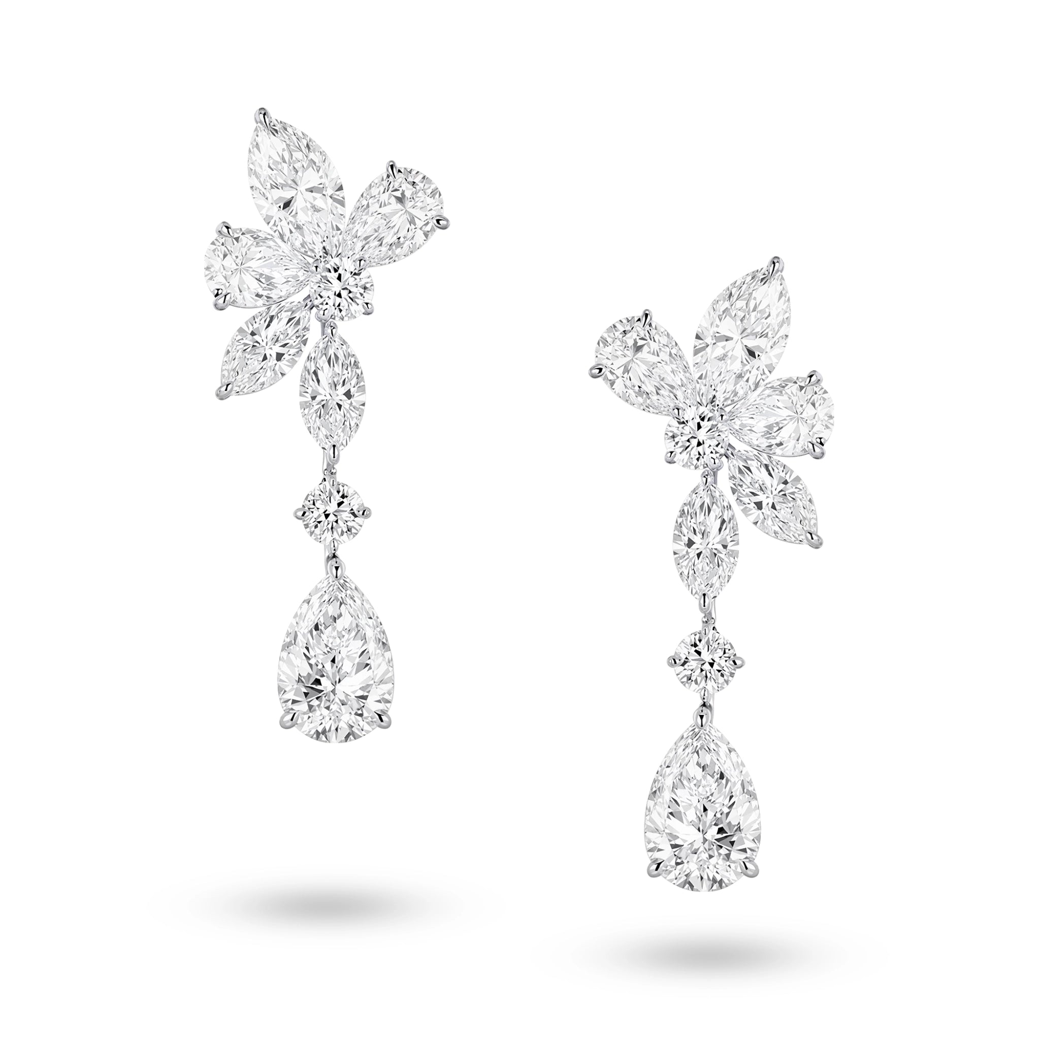 J'ENCHANTE The Celestia Drop earrings in 18K white gold, featuring pear, marquise and round diamonds, shown as a front-facing pair on a white background.