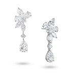 J'ENCHANTE The Celestia Drop 18K white gold diamond earrings, shown with one front view and one side view highlighting the pear-shaped drop diamond and floral cluster setting.
