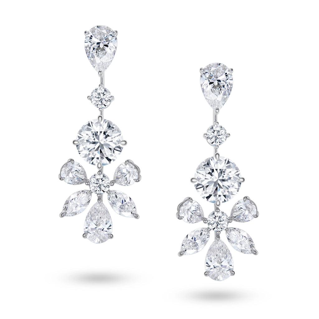 J'ENCHANTE The Grand Aria earrings in 18K white gold, featuring pear, round brilliant and marquise diamonds in a cascading drop design, shown as a front-facing pair on a white background.