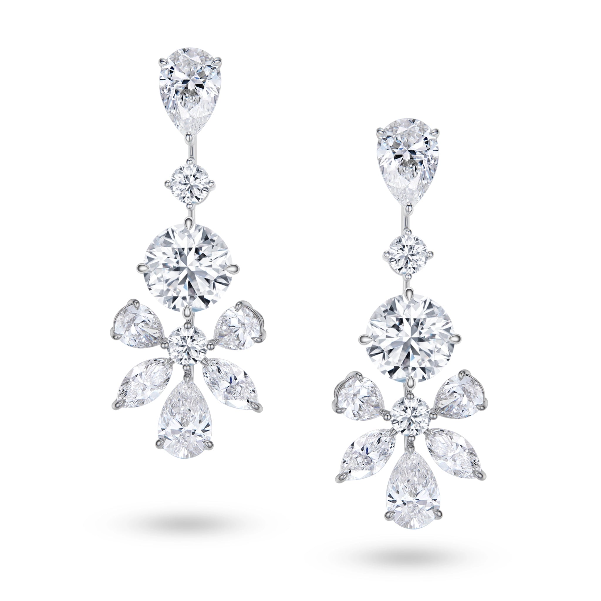 J'ENCHANTE The Grand Aria earrings in 18K white gold, featuring pear, round brilliant and marquise diamonds in a cascading drop design, shown as a front-facing pair on a white background.