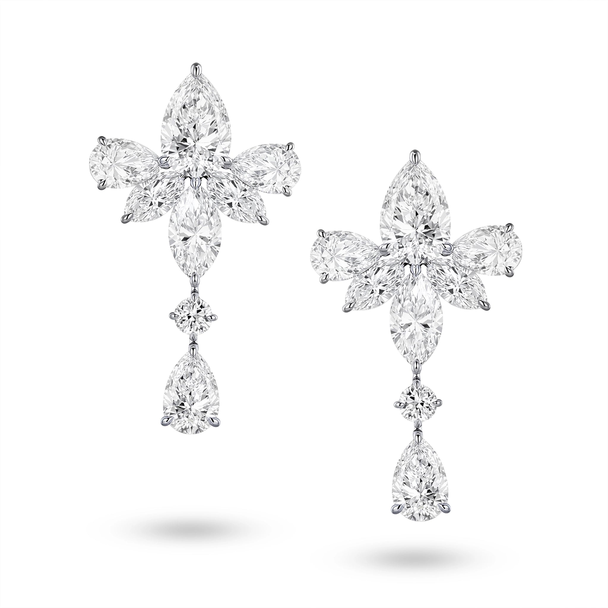 J'ENCHANTE The Lyris Bloom earrings in 18K white gold, featuring pear, marquise and round diamonds in a floral drop design, shown as a front-facing pair on a white background.