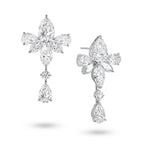J'ENCHANTE The Lyris Bloom 18K white gold diamond earrings, shown with one front view and one side view highlighting the pear-shaped drop diamond and floral setting details.