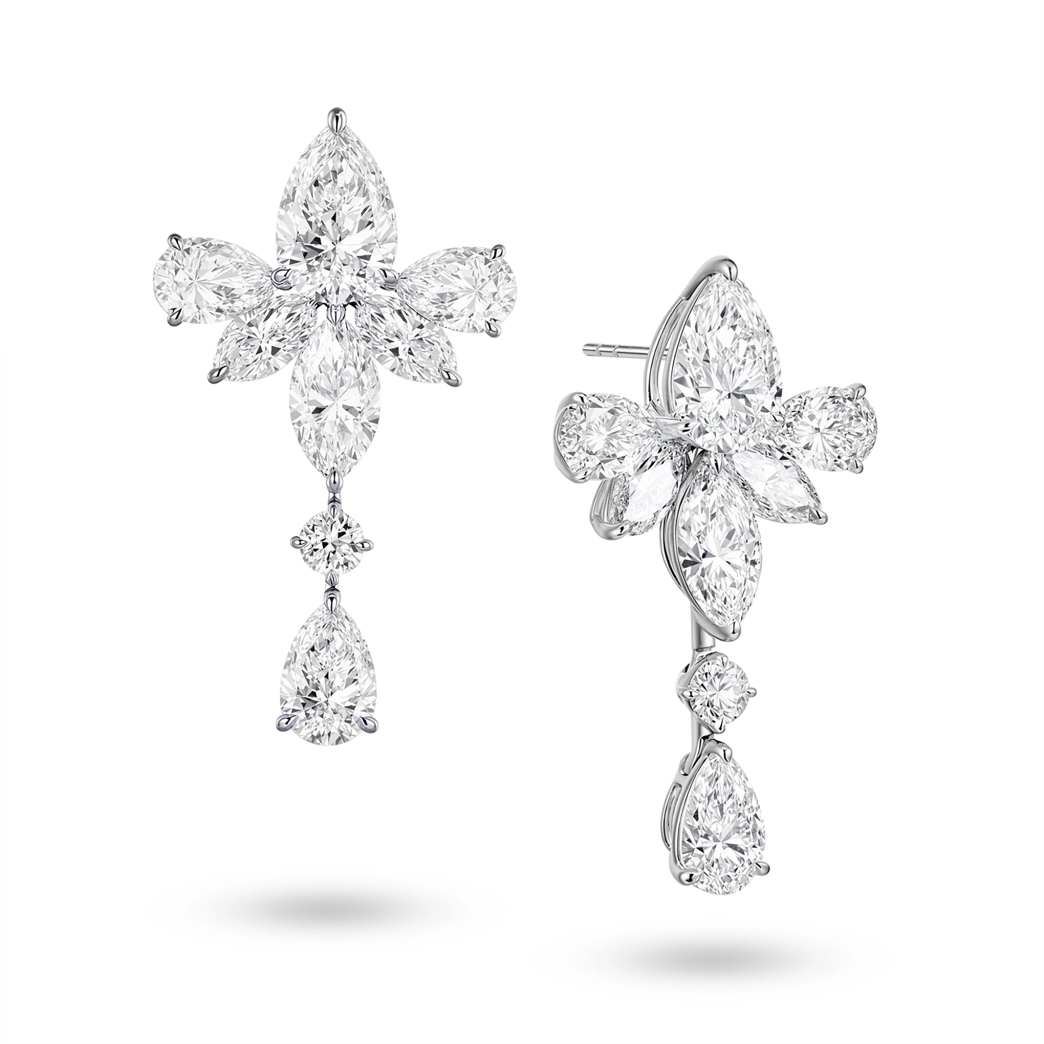 J'ENCHANTE The Lyris Bloom 18K white gold diamond earrings, shown with one front view and one side view highlighting the pear-shaped drop diamond and floral setting details.