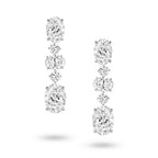 J'ENCHANTE The Élan Line earrings in 18K white gold, featuring oval lab grown diamonds and round brilliant accents, shown as a front-facing pair on a white background.