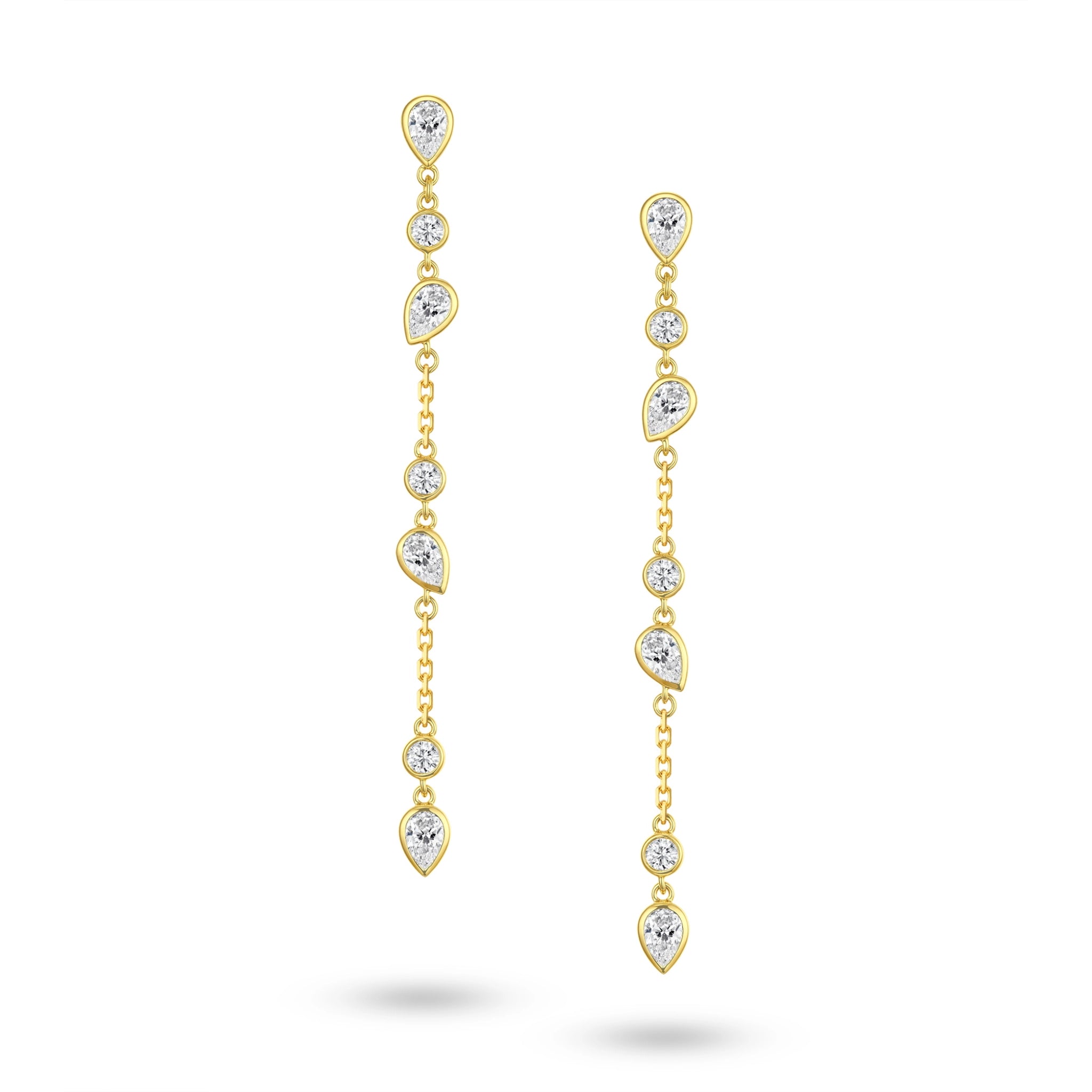 Front view of the J'ENCHANTE DEW cascading diamond drop earrings in gold. Showcasing a graceful 52.5mm drop, each earring features a striking layered cascade of 7 alternating teardrop and round diamonds (approx. 0.6 carats). This refined mixed-cut design catches the light from every angle, perfect for effortlessly elevating both day and evening looks.