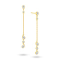 Angled view of the J'ENCHANTE DEW Teardrop Rhythm diamond drop earrings. The image highlights the delicate gold setting and the exquisite details of the alternating pear and round brilliant cuts. The refined facets catch the light from every angle, adding stunning depth and brilliance—making it the ideal piece to transition from day to evening wear effortlessly.