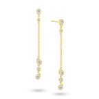 Angled view of the J'ENCHANTE DEW Teardrop Rhythm diamond drop earrings. The image highlights the delicate gold setting and the exquisite details of the alternating pear and round brilliant cuts. The refined facets catch the light from every angle, adding stunning depth and brilliance—making it the ideal piece to transition from day to evening wear effortlessly.