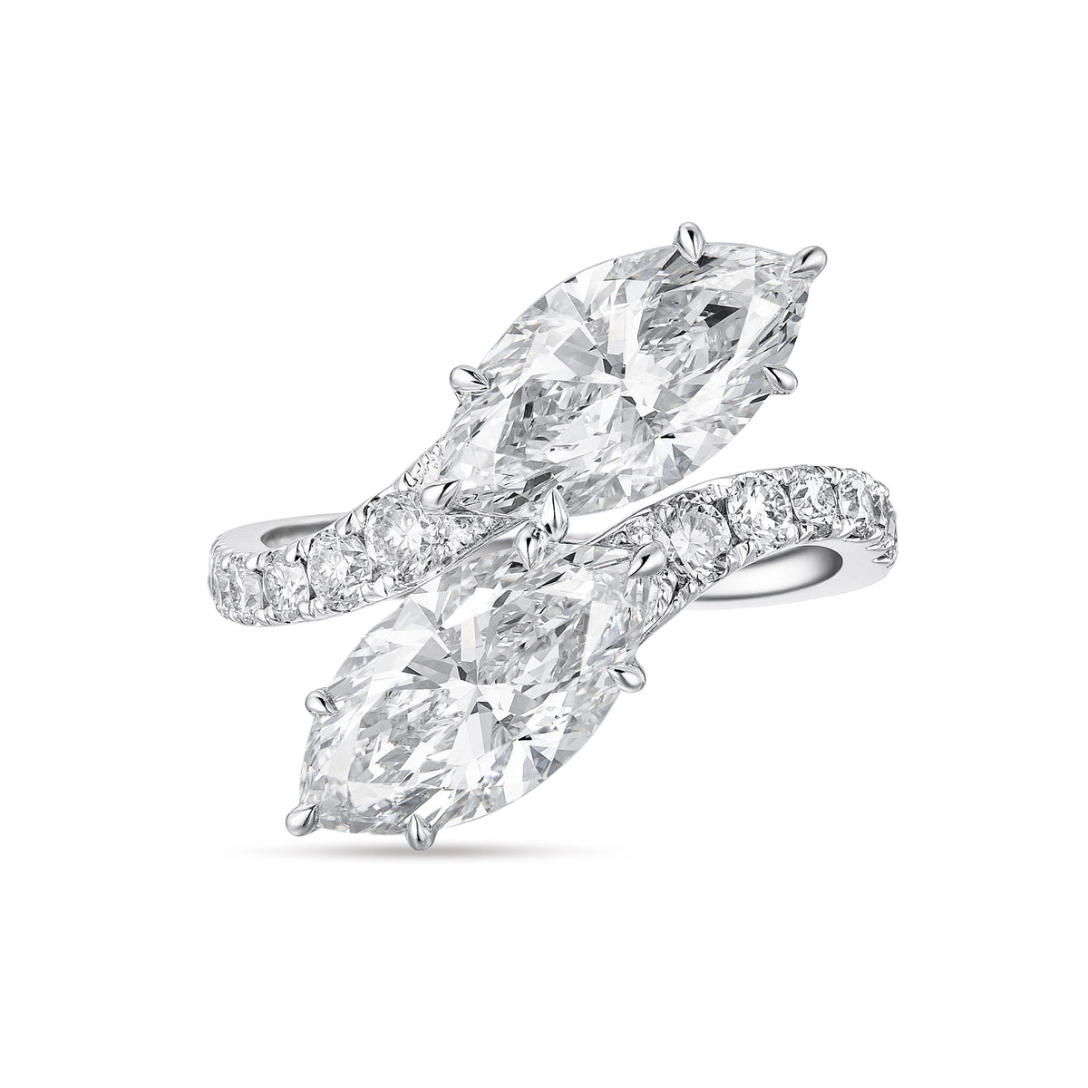 Top view of the J'ENCHANTE DUO double stone ring in 18K white gold. Featuring a graceful bypass design, the ring showcases two magnificent 2-carat marquise-cut diamonds. The fluid pavé-set band creates a sense of movement and sculptural balance, offering a bold yet refined "Toi et Moi" elegance.