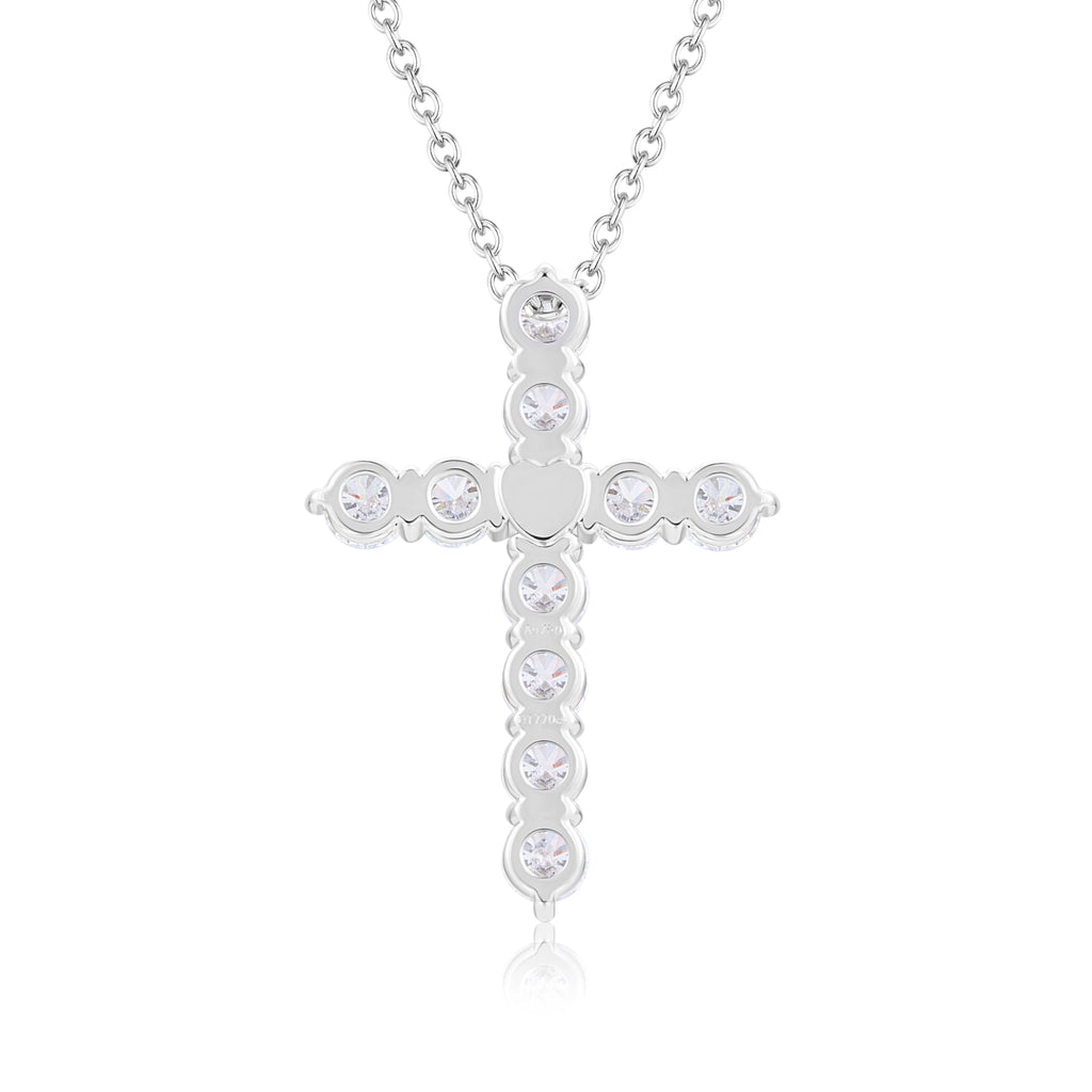 Back gallery view of the J'ENCHANTE HOPE Radiant Cross diamond necklace in 18K white gold. Showcasing the flawlessly polished reverse side and open light-entry holes for maximum brilliance. The structural intersection reveals a hidden, delicately crafted heart motif—adding a secret, deeply personal touch of romance to this powerful symbol.