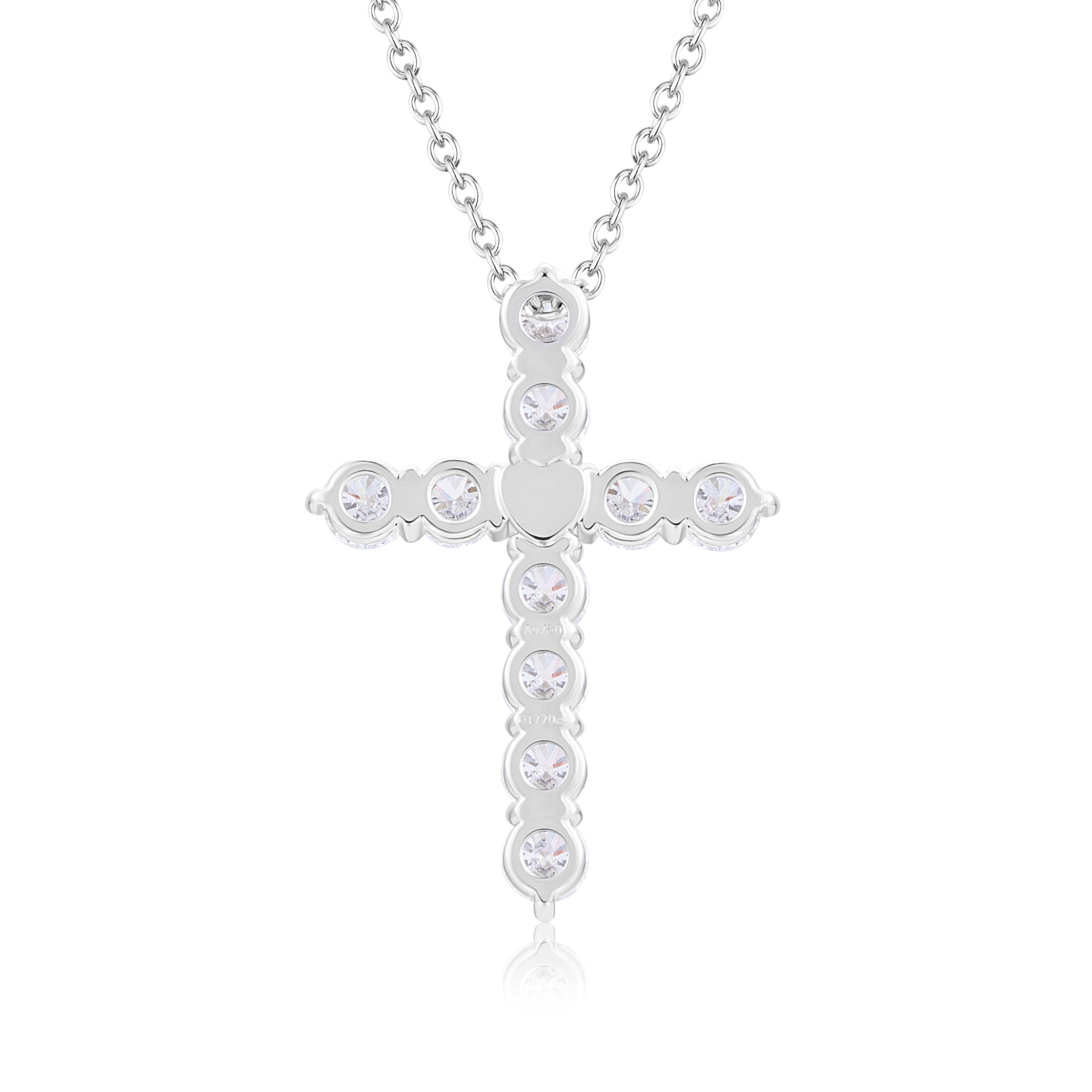Back gallery view of the J'ENCHANTE HOPE Radiant Cross diamond necklace in 18K white gold. Showcasing the flawlessly polished reverse side and open light-entry holes for maximum brilliance. The structural intersection reveals a hidden, delicately crafted heart motif—adding a secret, deeply personal touch of romance to this powerful symbol.