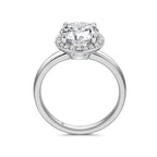 Upright profile view of the J'ENCHANTE JOY 18K white gold halo diamond ring, displaying the elegant circular band and the layered proportions of the four-prong setting and luminous 0.10-carat diamond halo.