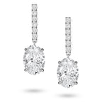 Front view of the J'ENCHANTE JOY oval bar stud earrings, featuring slim vertical bars pavé-set with 12 diamonds (0.2 carats) suspending softly contoured oval focal stones, creating a refined contrast of clean lines and graceful curves.