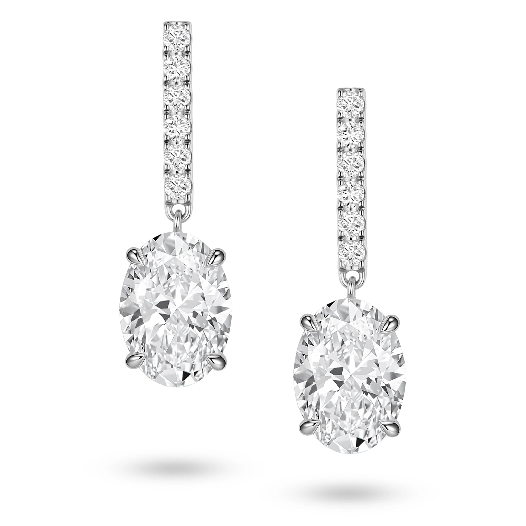 Front view of the J'ENCHANTE JOY oval bar stud earrings, featuring slim vertical bars pavé-set with 12 diamonds (0.2 carats) suspending softly contoured oval focal stones, creating a refined contrast of clean lines and graceful curves.