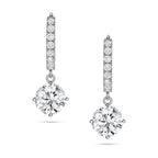 Front view of the J'ENCHANTE JOY round drop earrings, featuring a pair of clean, refined 18K white gold hoops adorned with 16 pavé-set diamonds (approx. 0.2 carats) suspending luminous round brilliant focal stones.