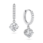 Angled view of the J'ENCHANTE JOY round drop earrings in 18K white gold, showcasing a pair of slim pavé hoops and brilliant round drops. One earring highlights the signature J-shaped side profile, designed to maximize side light entry for enhanced diamond clarity and depth.