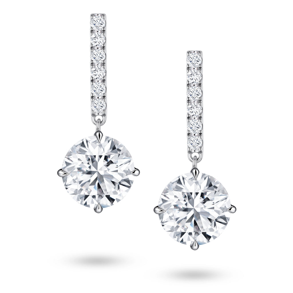Front view of the J'ENCHANTE JOY round bar stud earrings, featuring slim vertical bars pavé-set with 12 diamonds (0.2 carats), suspending a brilliant round focal stone for a clean, refined linear silhouette.