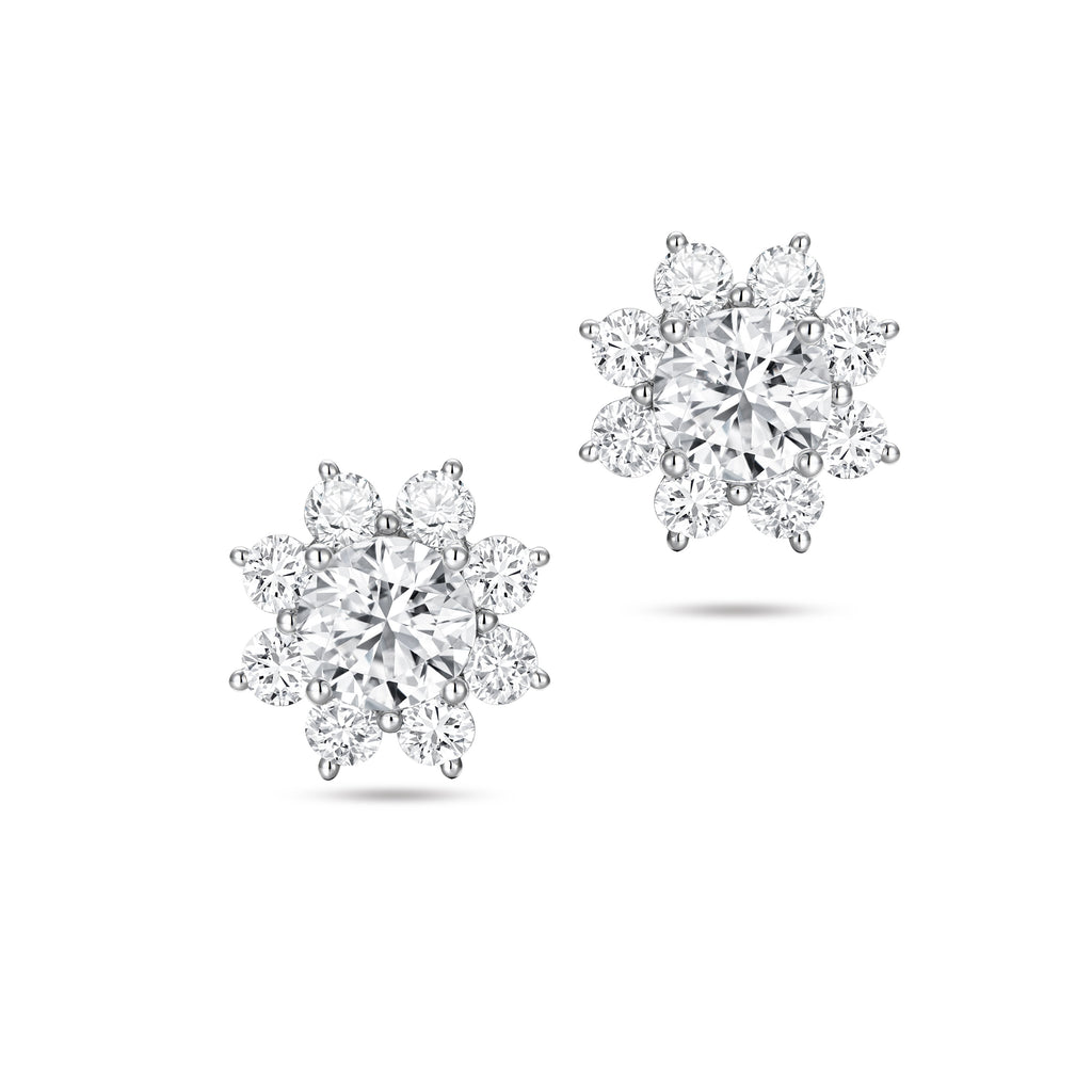 Front view of the J'ENCHANTE LIFE Bloom sunflower-inspired diamond stud earrings. Showcasing perfect symmetry, the design reflects the collection's theme of "the center of our world," where one luminous core is surrounded by brilliant diamonds. A beautiful expression of strength and warmth, crafted for meaningful everyday moments.