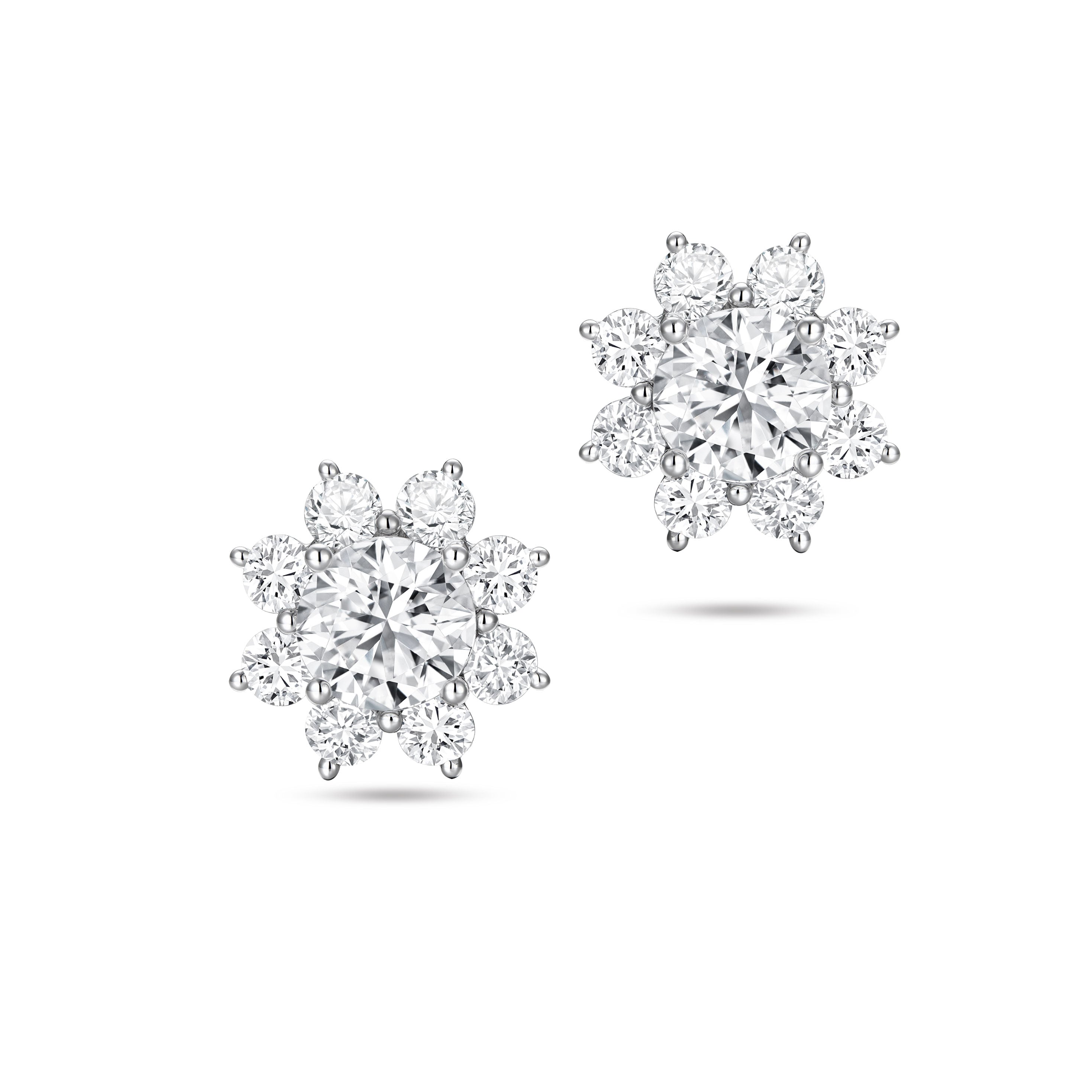 Front view of the J'ENCHANTE LIFE Bloom sunflower-inspired diamond stud earrings. Showcasing perfect symmetry, the design reflects the collection's theme of "the center of our world," where one luminous core is surrounded by brilliant diamonds. A beautiful expression of strength and warmth, crafted for meaningful everyday moments.