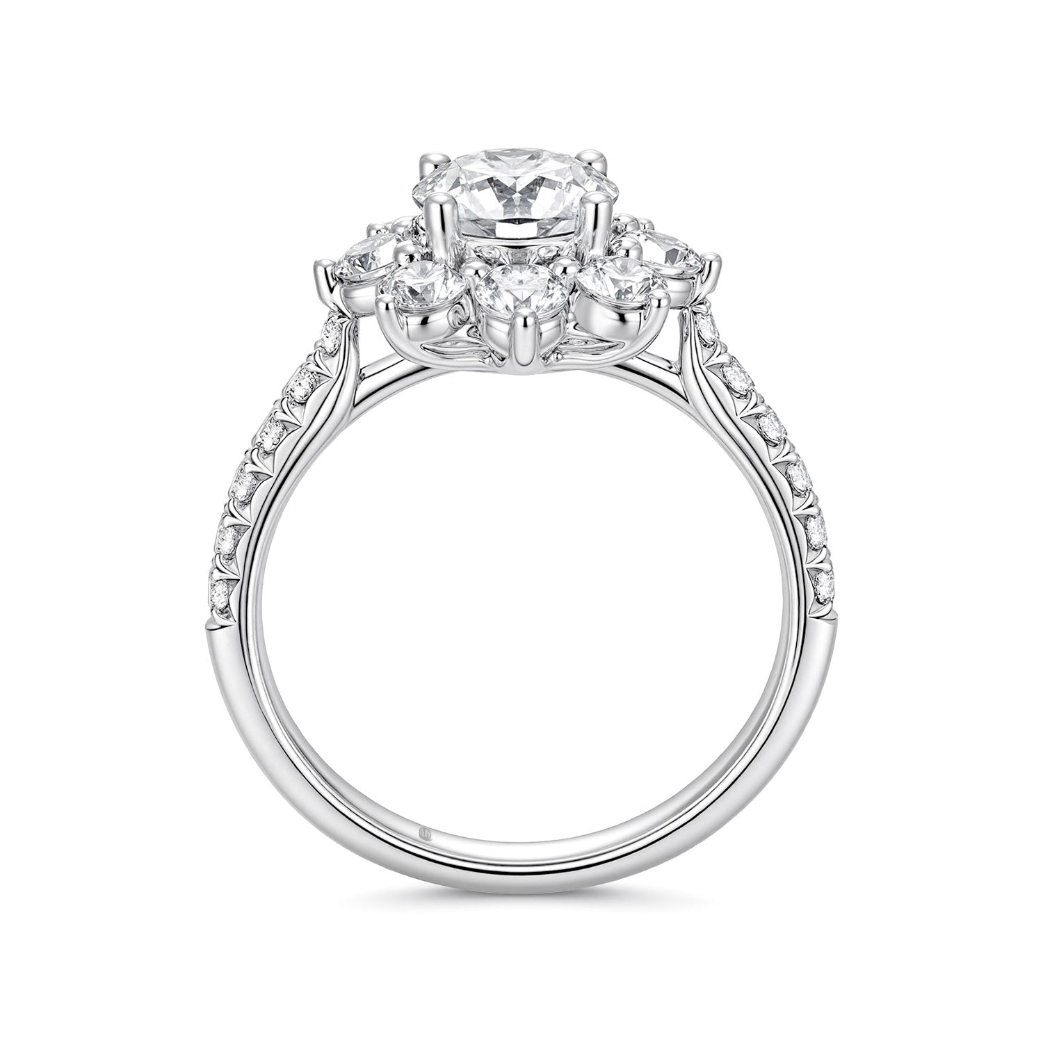 Upright profile view of the J'ENCHANTE LIFE Full Bloom diamond ring. This perspective reveals the intricate architectural support beneath the sunflower halo and its seamless transition into the pavé-set band, beautifully reflecting the collection's "center of our world" philosophy.