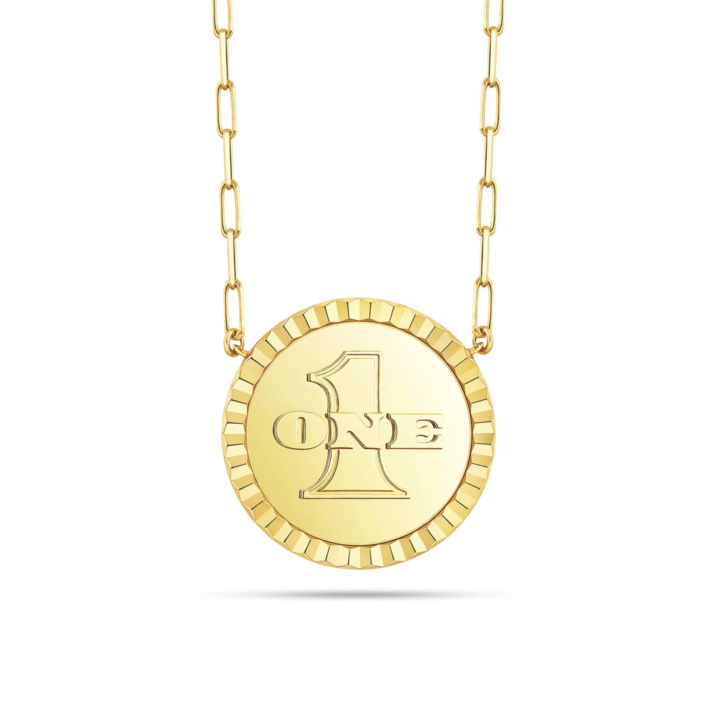 Reverse view of the J'ENCHANTE LUCK reversible medallion in 18K gold, featuring an iconic embossed "ONE" logo for a sophisticated, minimalist look that complements the diamond side.