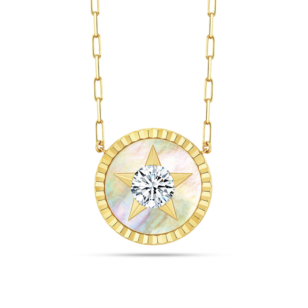 Front view of the J'ENCHANTE LUCK reversible star necklace in 18K gold, featuring a radiant mother-of-pearl star inlay with a brilliant 0.2ct diamond center, symbolizing luck and guidance.