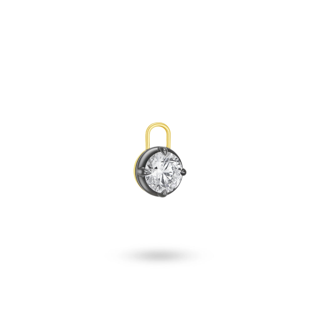 Angled view of the J'ENCHANTE MOD collection black frame lab-grown diamond pendant, highlighting the dark textured prongs and the 18k yellow gold loop for an edgy, custom look.
