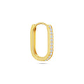 Angled view of the J'ENCHANTE MOD medium 0.1-carat pavé diamond hoop earring, highlighting the precision contrast between the clean 18k gold surface and the brilliant pavé setting, with a generous 14.8mm proportion.