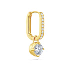 Angled view of the J'ENCHANTE MOD small 0.5-carat pavé round diamond drop hoop earring, highlighting the exquisite pavé setting on the 18k gold hoop and the secure, refined setting of the round brilliant focal stone.