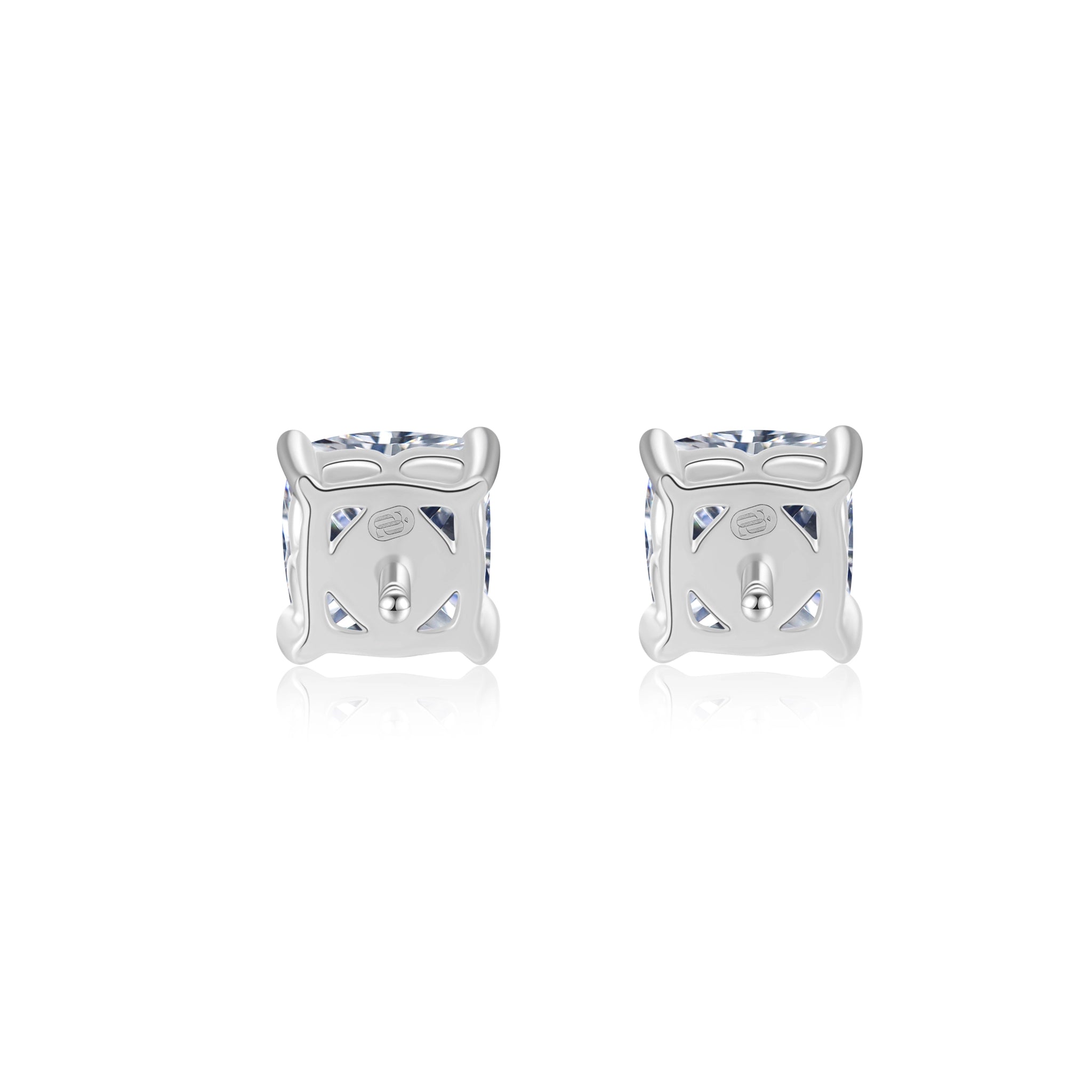 Back gallery view of the J'ENCHANTE ONE cushion diamond stud earrings, showcasing the intricately crafted open gallery and engraved brand hallmark. This refined back structure maximizes light passage from behind while ensuring a secure, flush, and comfortable fit on the earlobe.