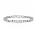 J'ENCHANTE ONE Facette Rhythm tennis bracelet with alternating round and emerald-cut lab-grown diamonds set in 18K white gold.