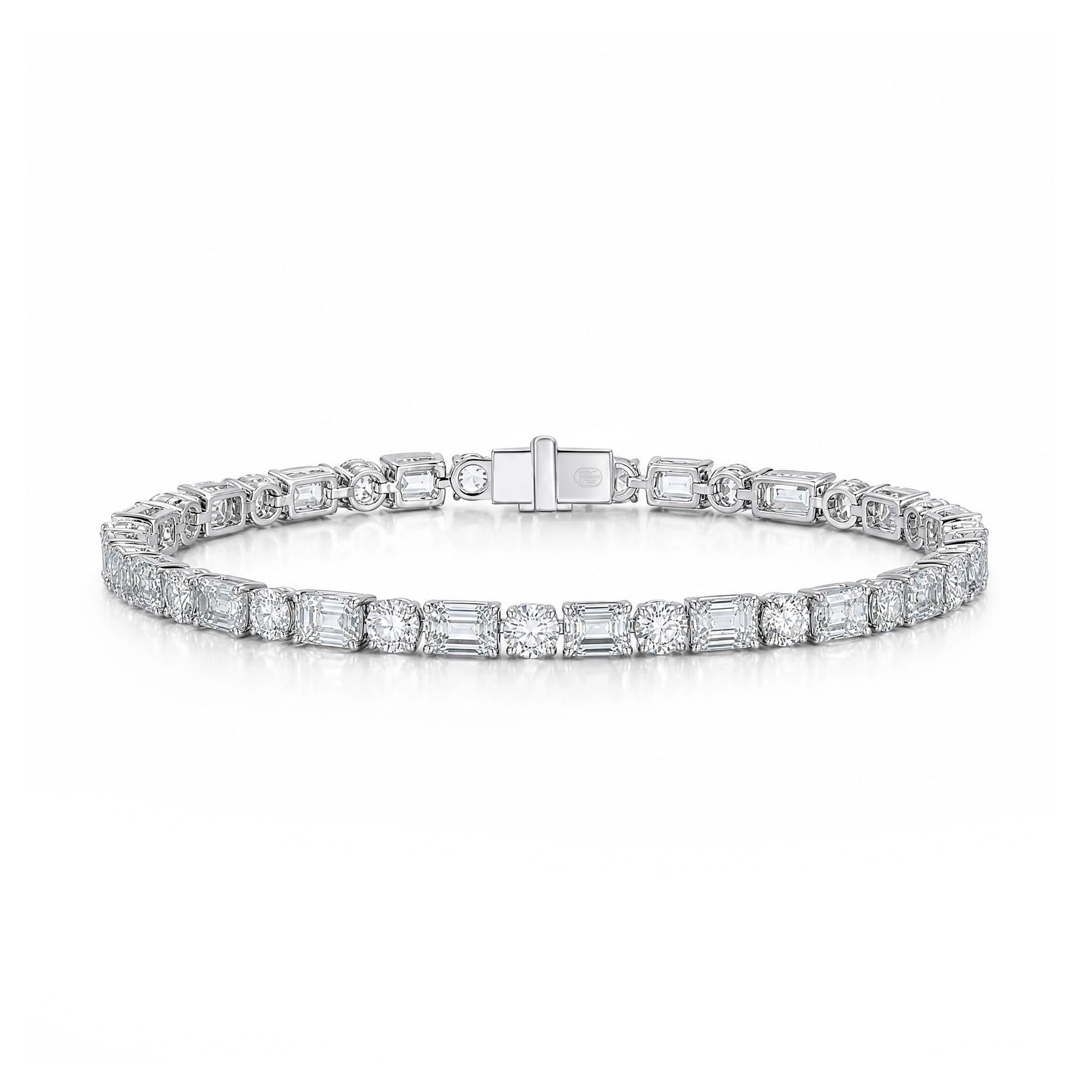 J'ENCHANTE ONE Facette Rhythm tennis bracelet with alternating round and emerald-cut lab-grown diamonds set in 18K white gold.