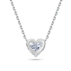 Back gallery view of the J'ENCHANTE ONE heart diamond necklace, showcasing the signature J-setting and open-backed structure. The graceful architectural curve flows seamlessly into the pendant, maximizing light passage from behind to lift the diamond and enhance its radiant brilliance.