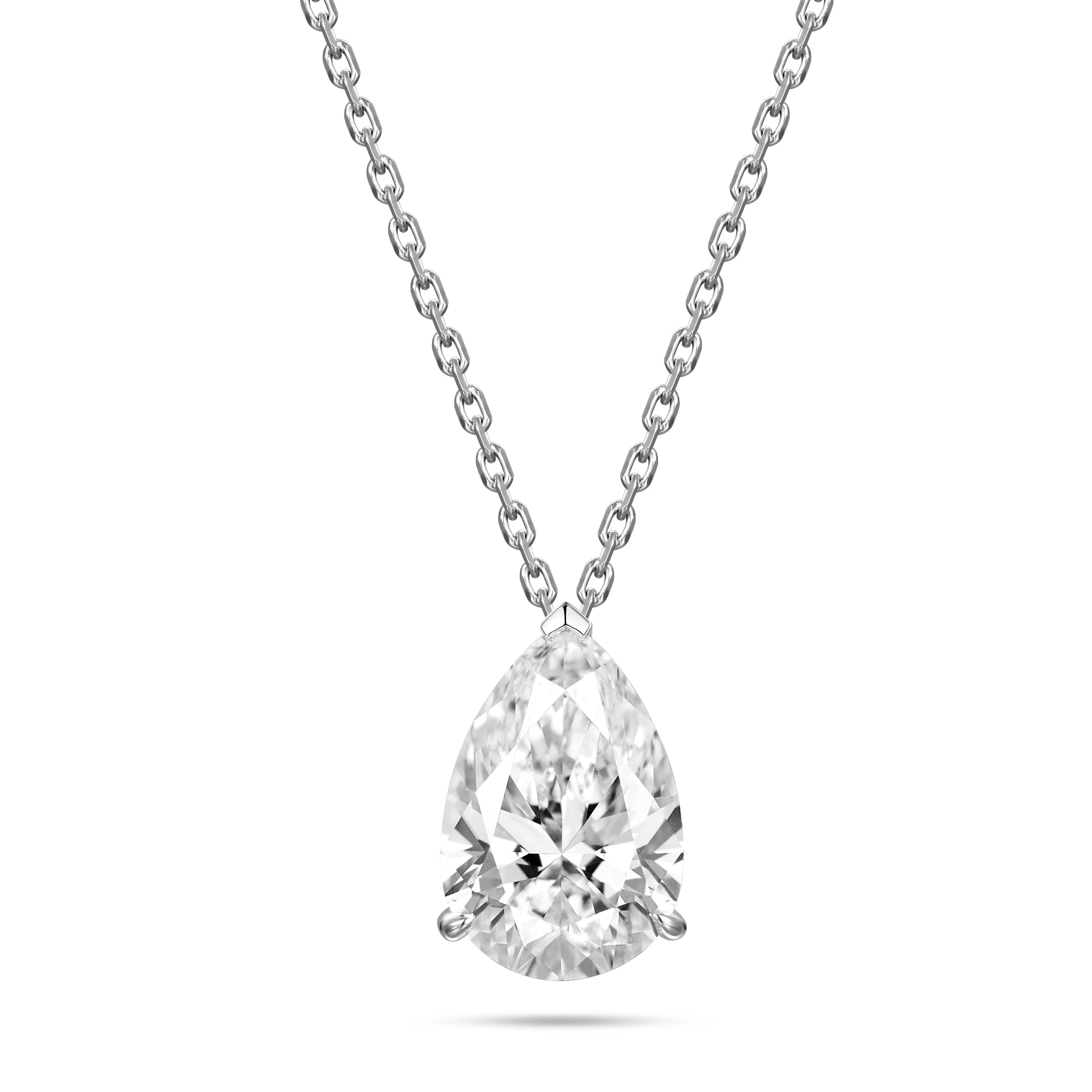 Front view of the J'ENCHANTE ONE pear-cut diamond solitaire necklace in white gold. Suspended on a delicate chain, the brilliant pear-shaped focal stone is defined by soft, architectural lines and a protective V-prong at the tip. The elegant, elongated silhouette expresses pure brilliance born from a single, graceful curve.