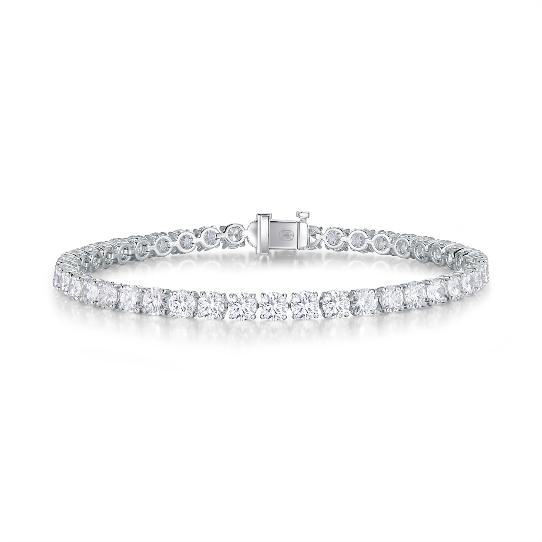 J'ENCHANTE ONE small diamond tennis bracelet in white gold, featuring a seamless, fluid array of round brilliant diamonds totaling approximately 6.85 carats. Each 0.15-carat stone is cradled in the signature J-setting—an elegant architectural arch designed to maximize light return for delicate everyday elegance.