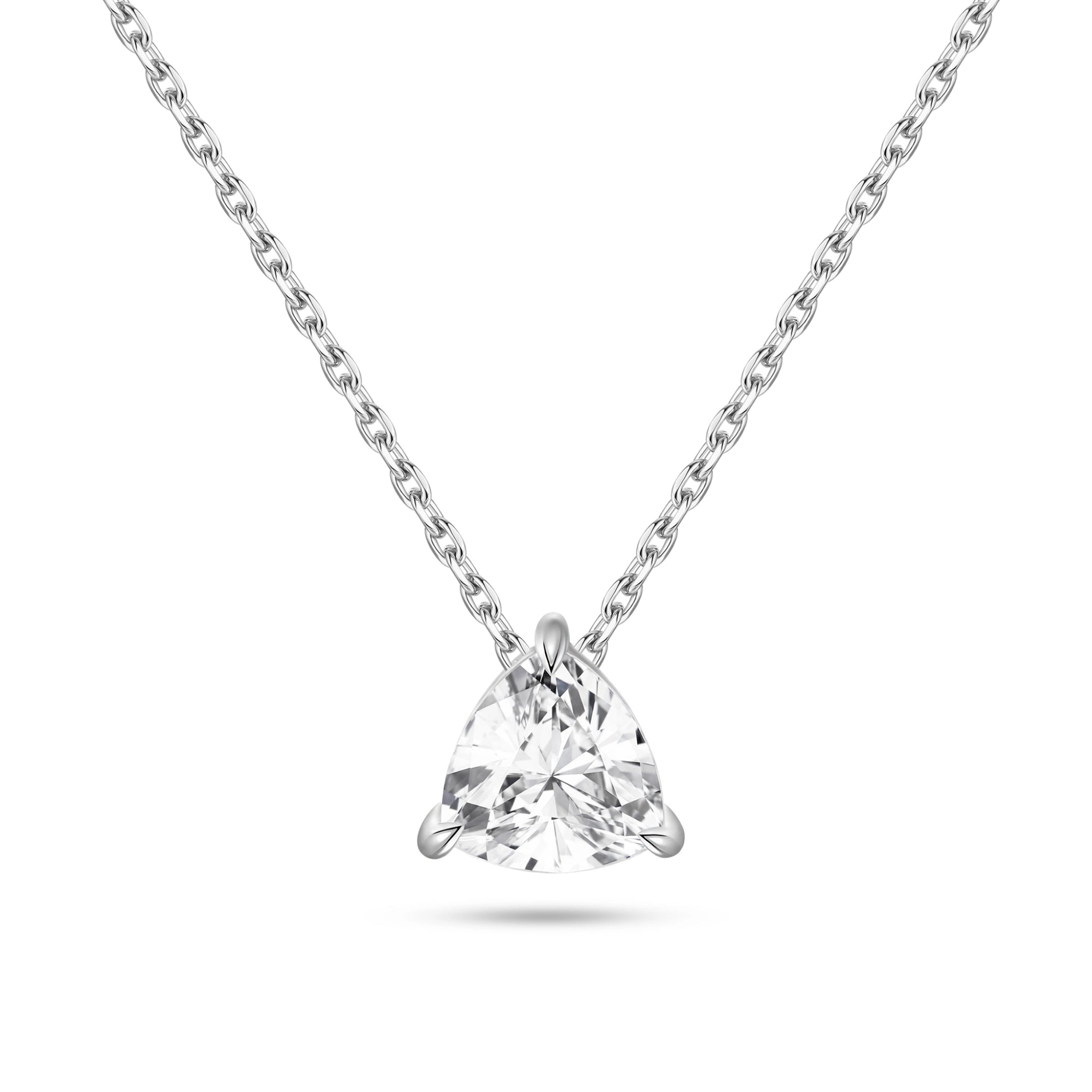 Front view of the J'ENCHANTE ONE trilliant-cut diamond solitaire necklace in white gold. Centered on a brilliant triangular diamond, the minimalist design highlights clean geometry softened by subtle curves, making a refined, confident, and unmistakably distinct statement.