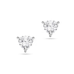Front view of the J'ENCHANTE ONE trilliant-cut diamond stud earrings in white gold. Featuring a striking triangular silhouette, the minimalist design captures pure light and bold geometric elegance, highlighting the rare trilliant center stone for a distinctive, modern statement.
