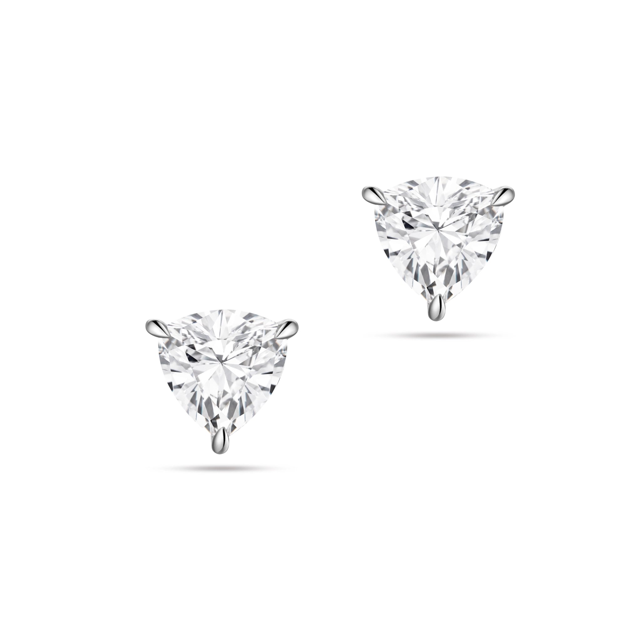 Front view of the J'ENCHANTE ONE trilliant-cut diamond stud earrings in white gold. Featuring a striking triangular silhouette, the minimalist design captures pure light and bold geometric elegance, highlighting the rare trilliant center stone for a distinctive, modern statement.